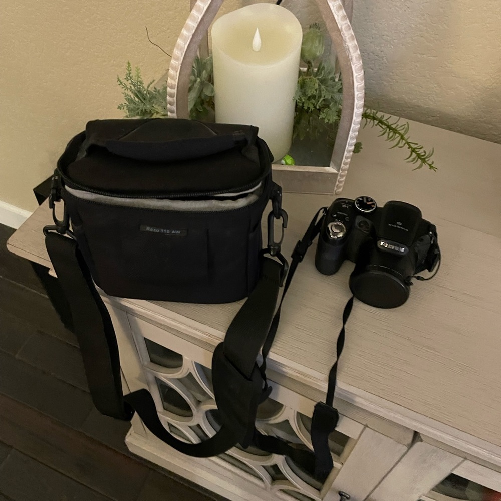 Fujifilm camera lightly used . We have gotten a new one and don't need 2